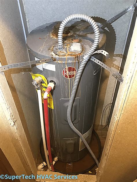 Why Is My Water Heater Leaking From The Top Vent And How。